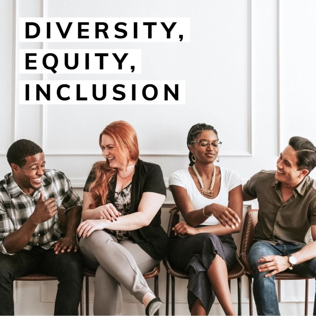 A diverse group of people collaborating, symbolizing inclusion and equity.